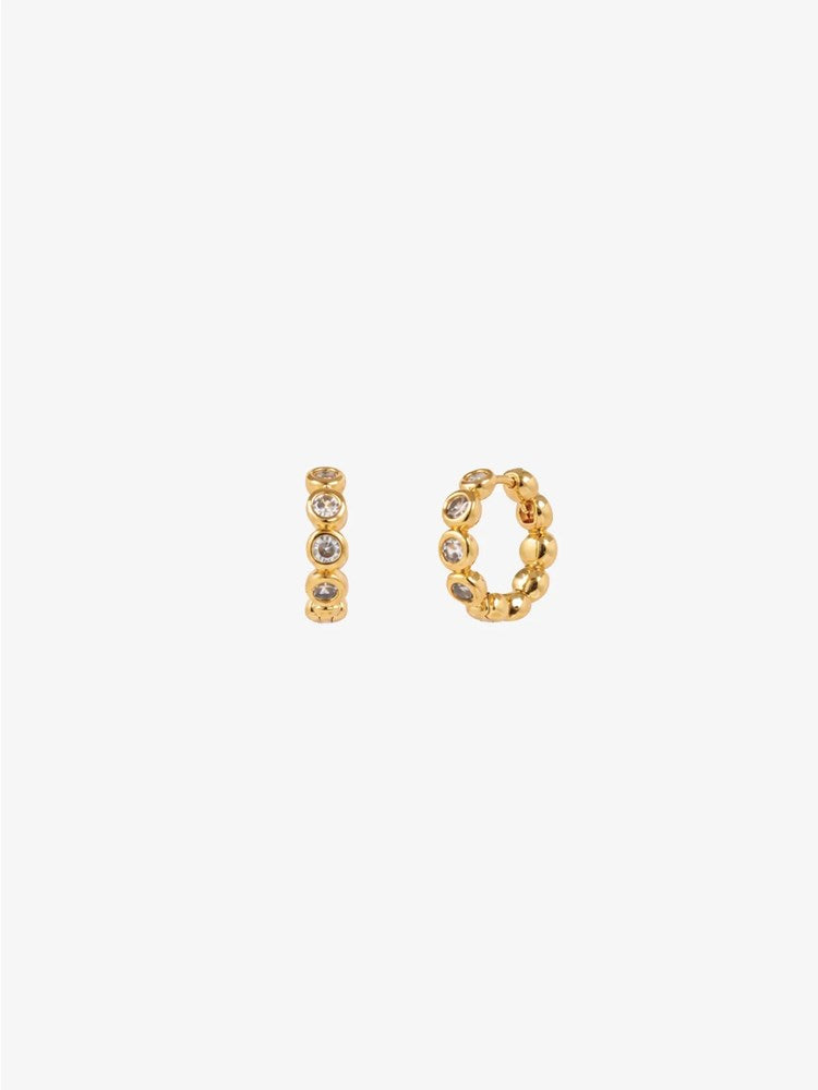 Image of Earrings. Product name - Solis 18K Gold Plated Bezel Huggie Earrings Gold in Gold colour by brand - Betty Basics