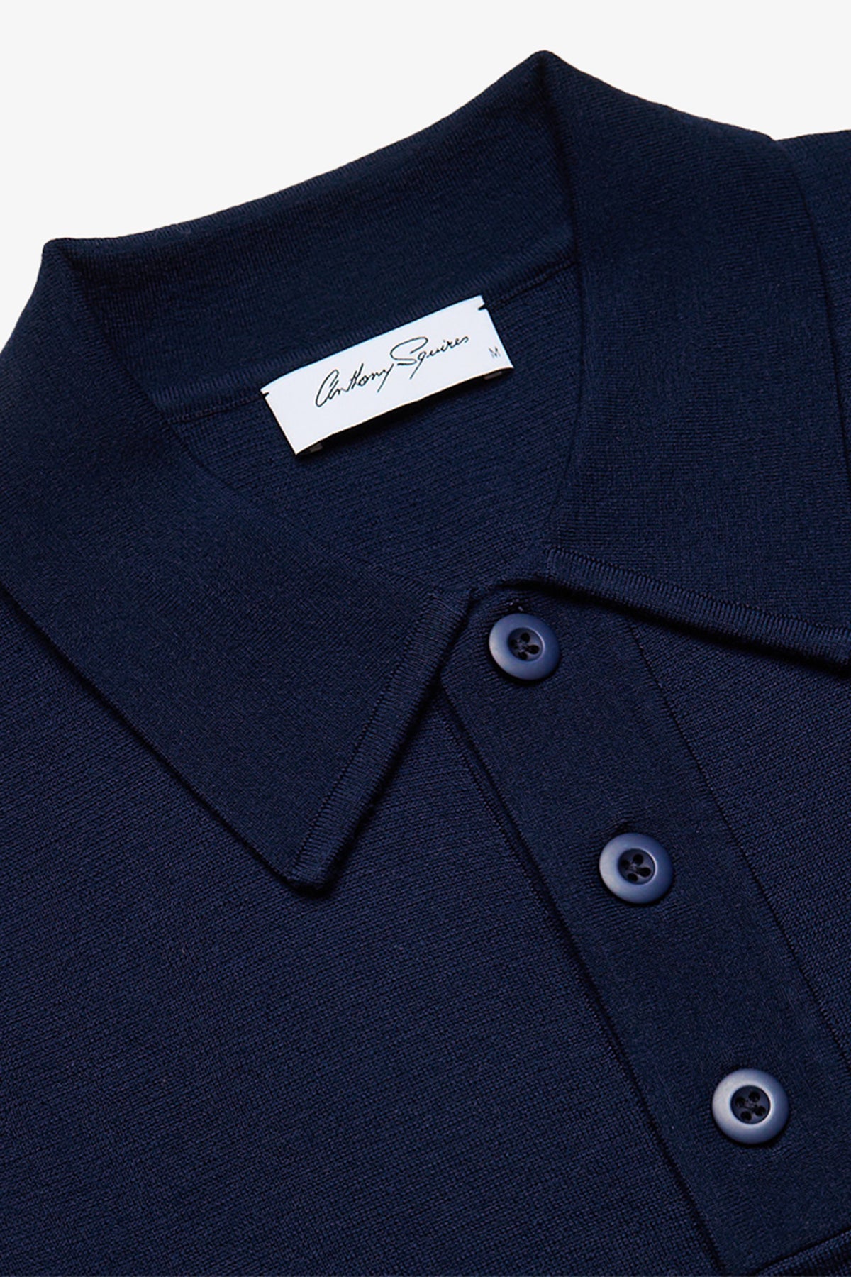 Image of a model wearing Tops. Productname: Anthony Squires Heavy weight blue L/S polo in Blue colour by brand - Anthony Squires