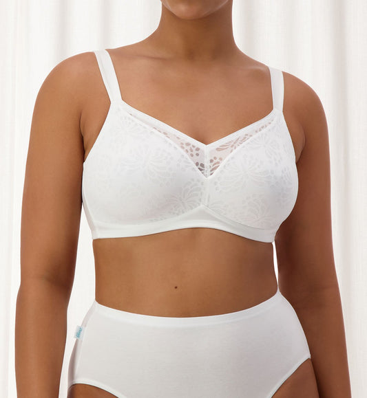 Image of Bras. Productname: Triumph Lacy Wirefree Minimiser in White colour by brand - Triumph