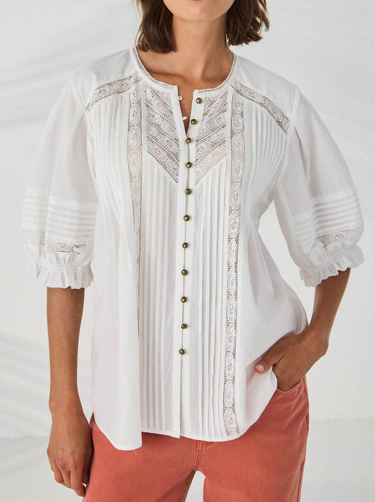 Image of a model wearing Tops. Product name - Lania The Label Dixie Shirt in Ivory colour by brand - Lania The Label