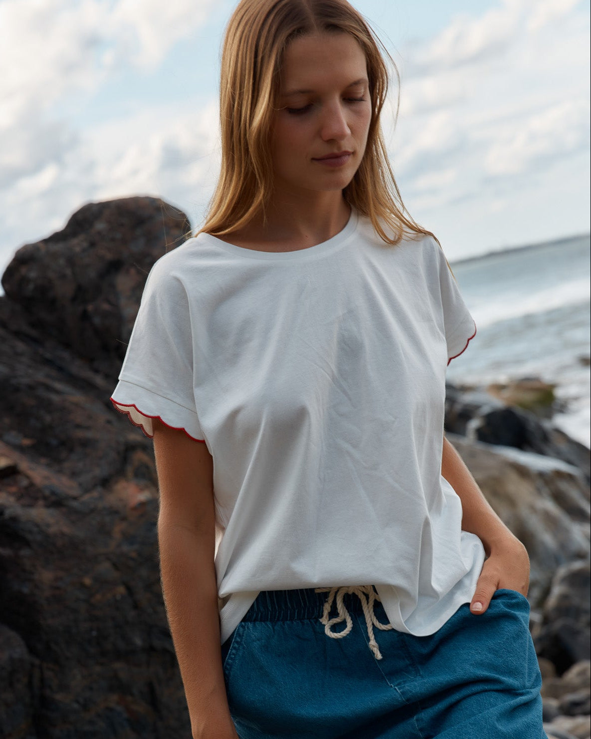 Image of a model wearing Tops. Productname: Betty Basics Sloane Scallop Tee White in White colour by brand - Betty Basics