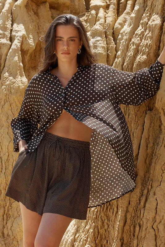 Image of a model wearing Shorts. Product name - Lune Relaxed Short Micro Dot in Micro Dot colour by brand - Sass Clothing