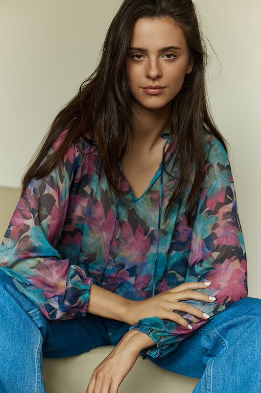 Image of a model wearing Tops. Product name - Willow Tie Front Blouse in Native Orchid colour by brand - Sass Clothing