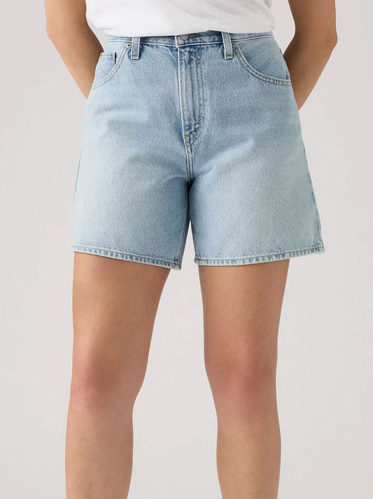 Image of a model wearing Shorts. Productname: LEVI'S HIGH RISE BAGGY SHORTS in Denim colour by brand - Levis