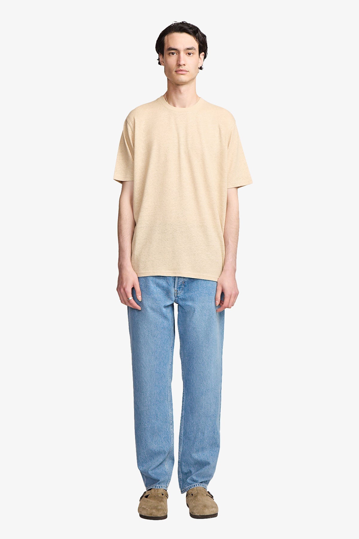 Image of a model wearing Tops. Productname: Anthony Squires Fawn linen blend tee in Fawn colour by brand - Anthony Squires