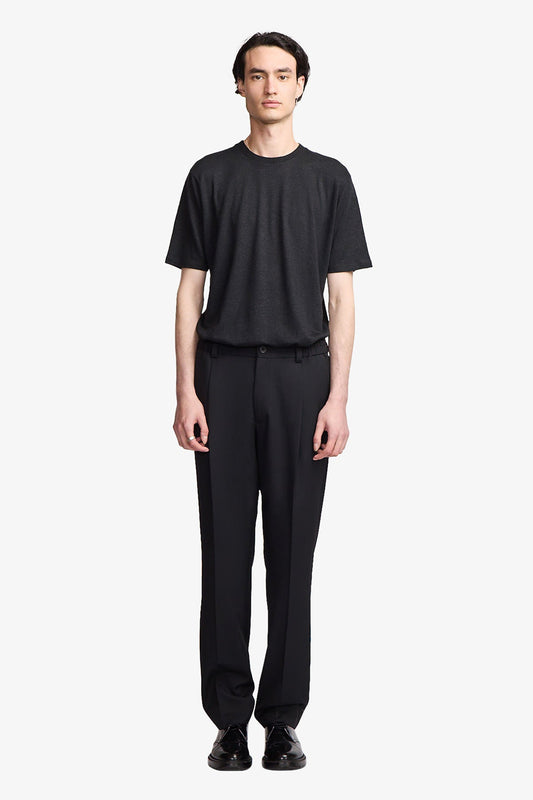 Image of a model wearing Tops. Productname: Anthony Squires Black linen blend tee in Black colour by brand - Anthony Squires