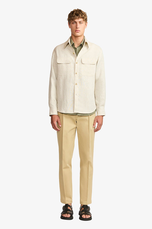 Image of a model wearing Outerwear. Product name - Overshirt linen in Linen colour by brand - Anthony Squires