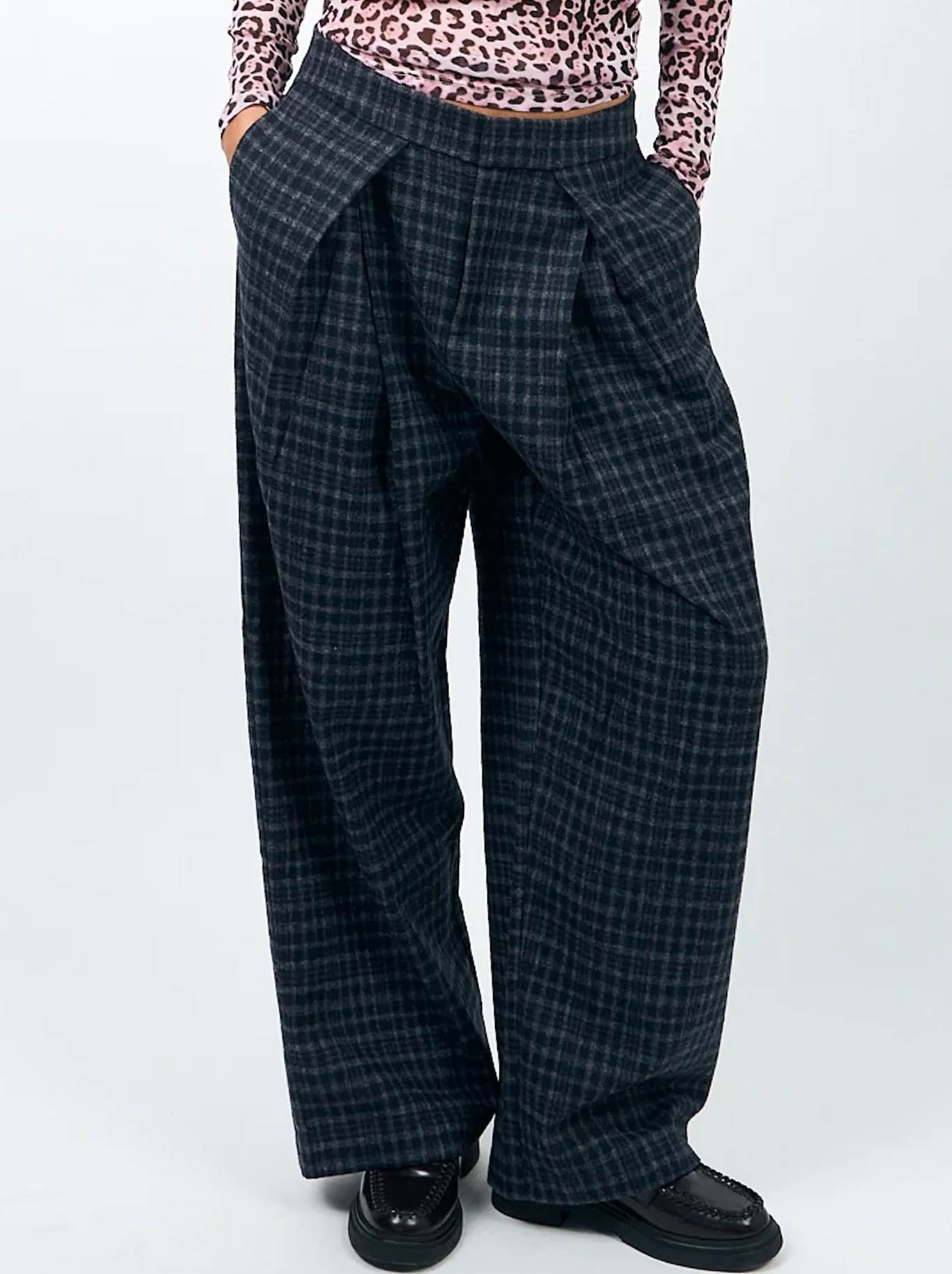 Image of a model wearing Pants. Product name - Lollys Laundry Zola Pant in Dark Blue colour by brand - Lollys Laundry