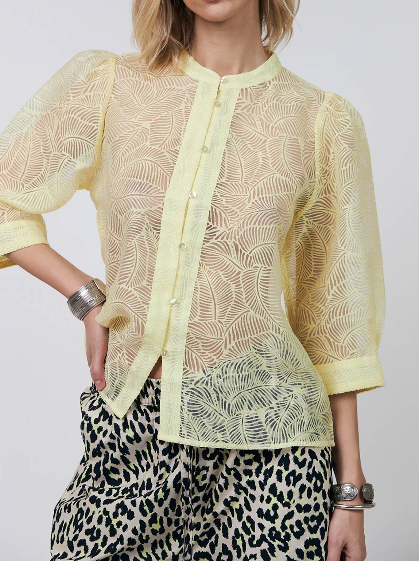 Image of a model wearing Tops. Product name - Lolly'S Laundry Bono Shirt in Light Yellow colour by brand - Lollys Laundry