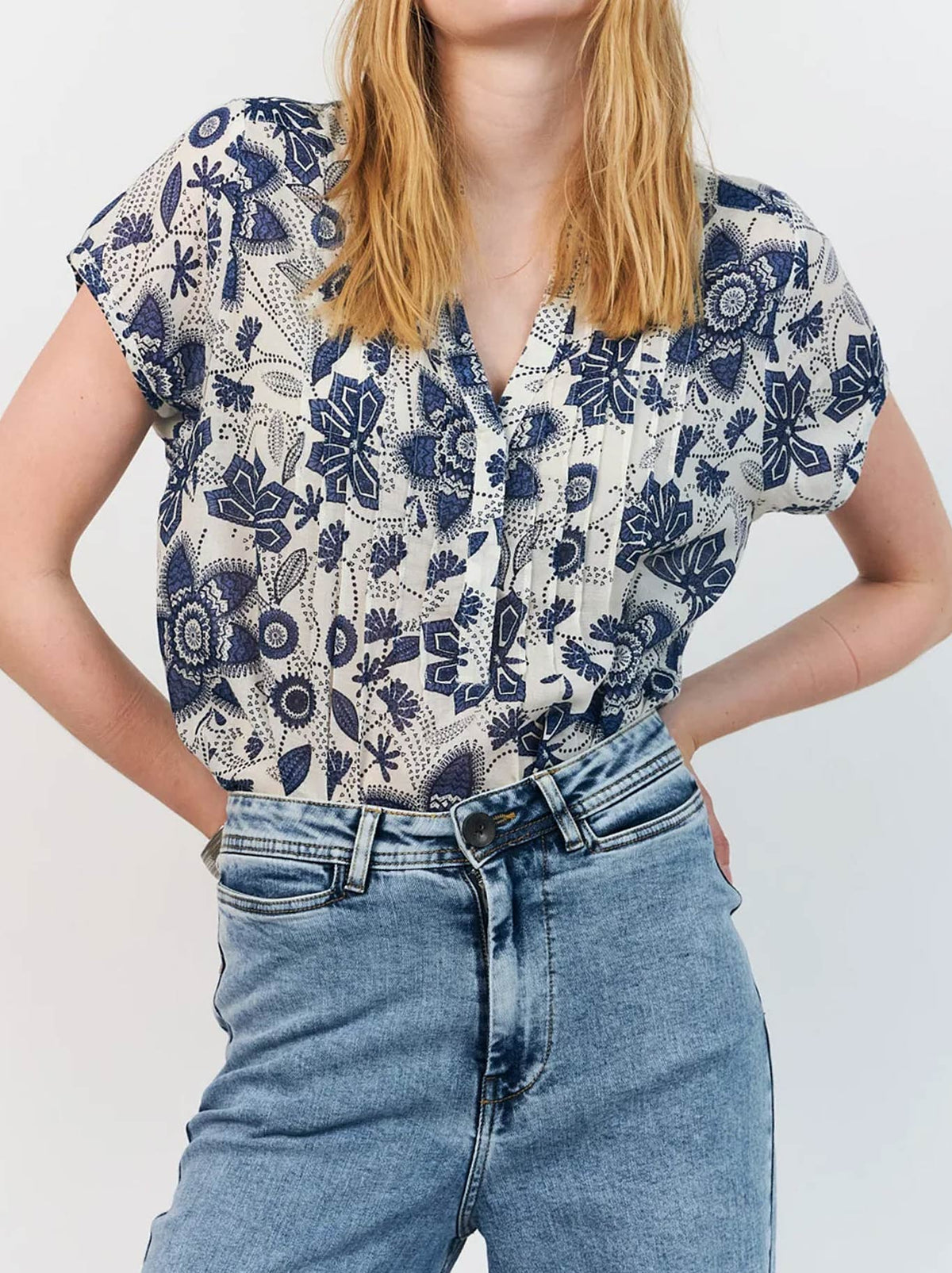 Image of a model wearing Tops. Product name - LOLLYS LAUNDRY HEATHER TOP in Blue colour by brand - Lollys Laundry