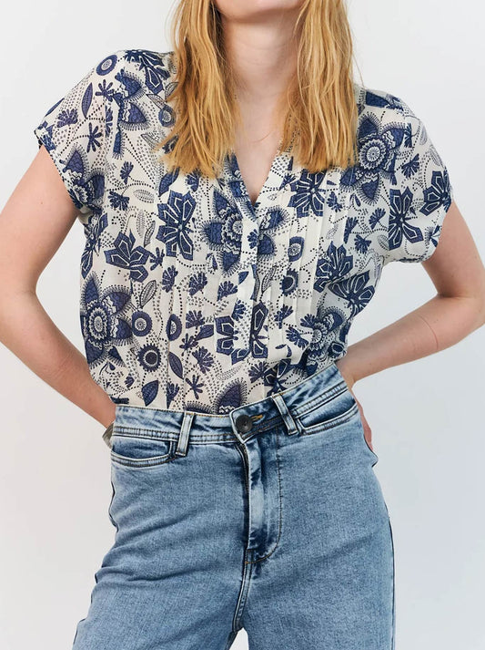 Image of a model wearing Tops. Product name - LOLLYS LAUNDRY HEATHER TOP in Blue colour by brand - Lollys Laundry