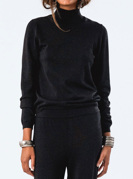 Image of a model wearing Tops. Productname: LOLLYS LAUNDRY BEAUMONTLL KNIT in Black colour by brand - Lollys Laundry