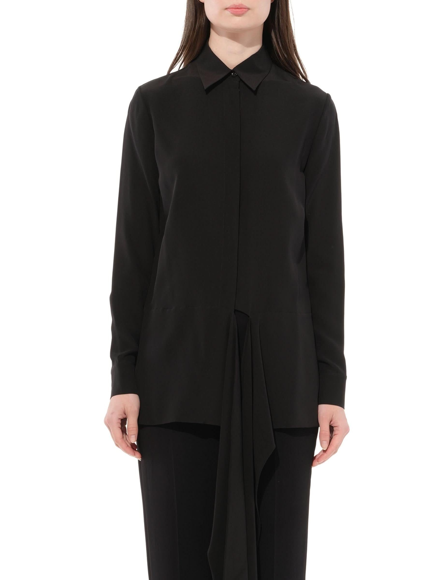 Image of a model wearing Tops. Productname: GIVENCHY Long Sleeve Blouse in Black colour by brand - GIVENCHY