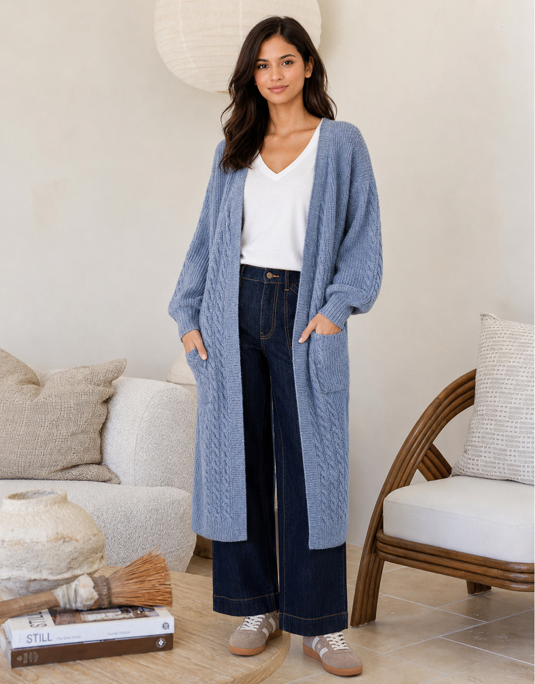 Image of a model wearing Outerwear. Product name - Longline Cable Cardi Blue in Blue colour by brand - 132 Fashion