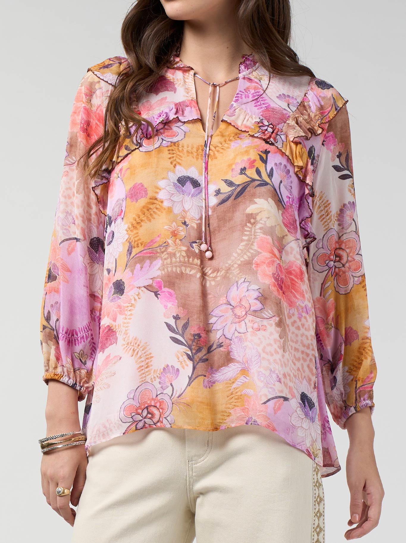 Image of a model wearing Tops. Product name - Loobie'S Story Batika Blouse in Multi colour by brand - Loobies Story