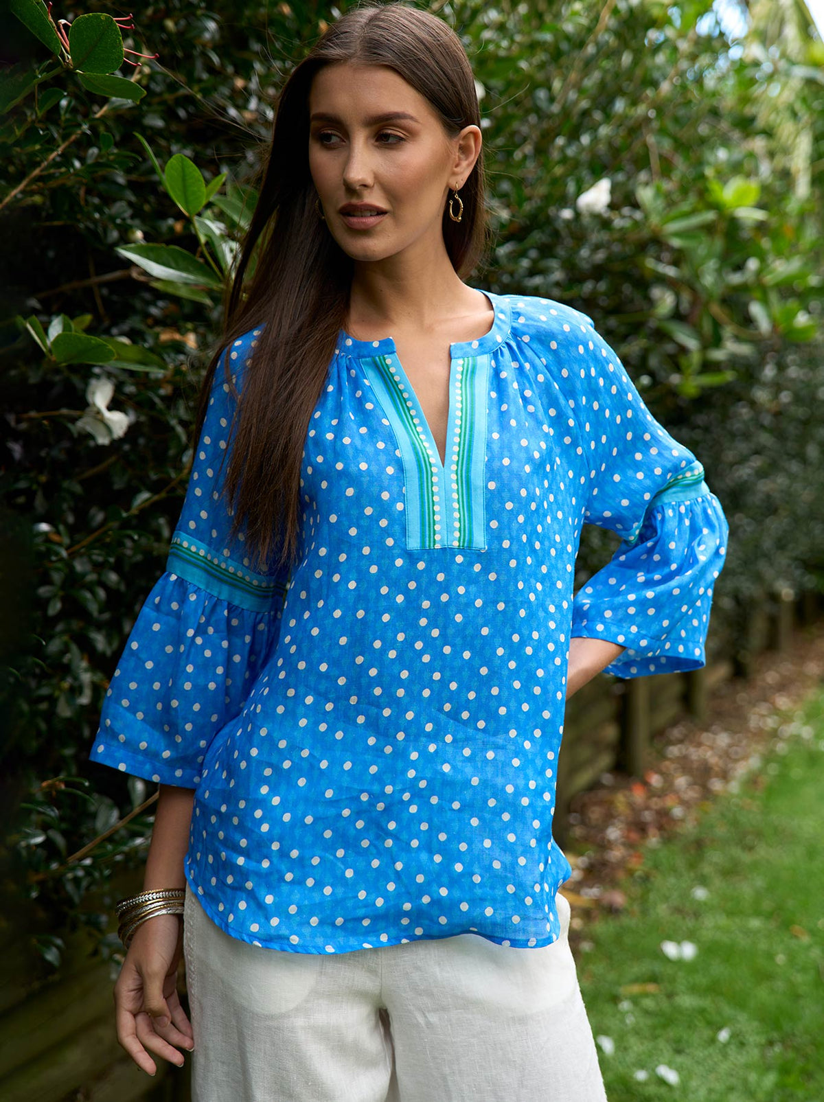 Image of a model wearing Tops. Product name - Loobie'S Story Samira Blouse in Electric Blue colour by brand - Loobies Story