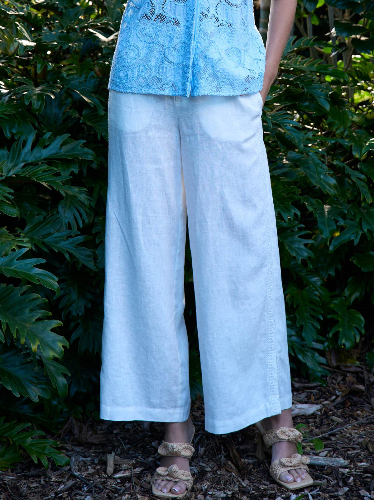 Image of a model wearing Pants. Product name - Loobie'S Story Firefly Pant in White colour by brand - Loobies Story
