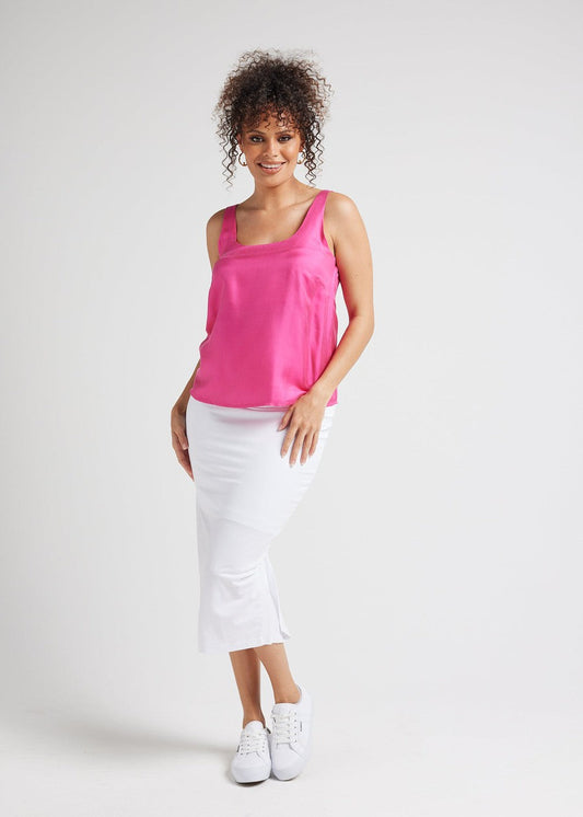 Image of a model wearing Tops. Product name - Poppy Silk Sleeveless Camisole Fuschia in Fuschia colour by brand - Lou Lou