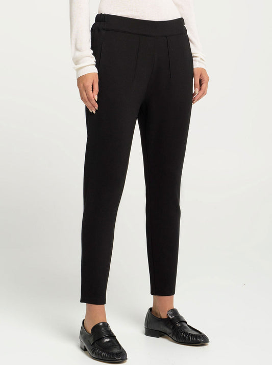 Image of a model wearing Pants. Productname: Lounge The Label Julian Pant in Black colour by brand - Lounge