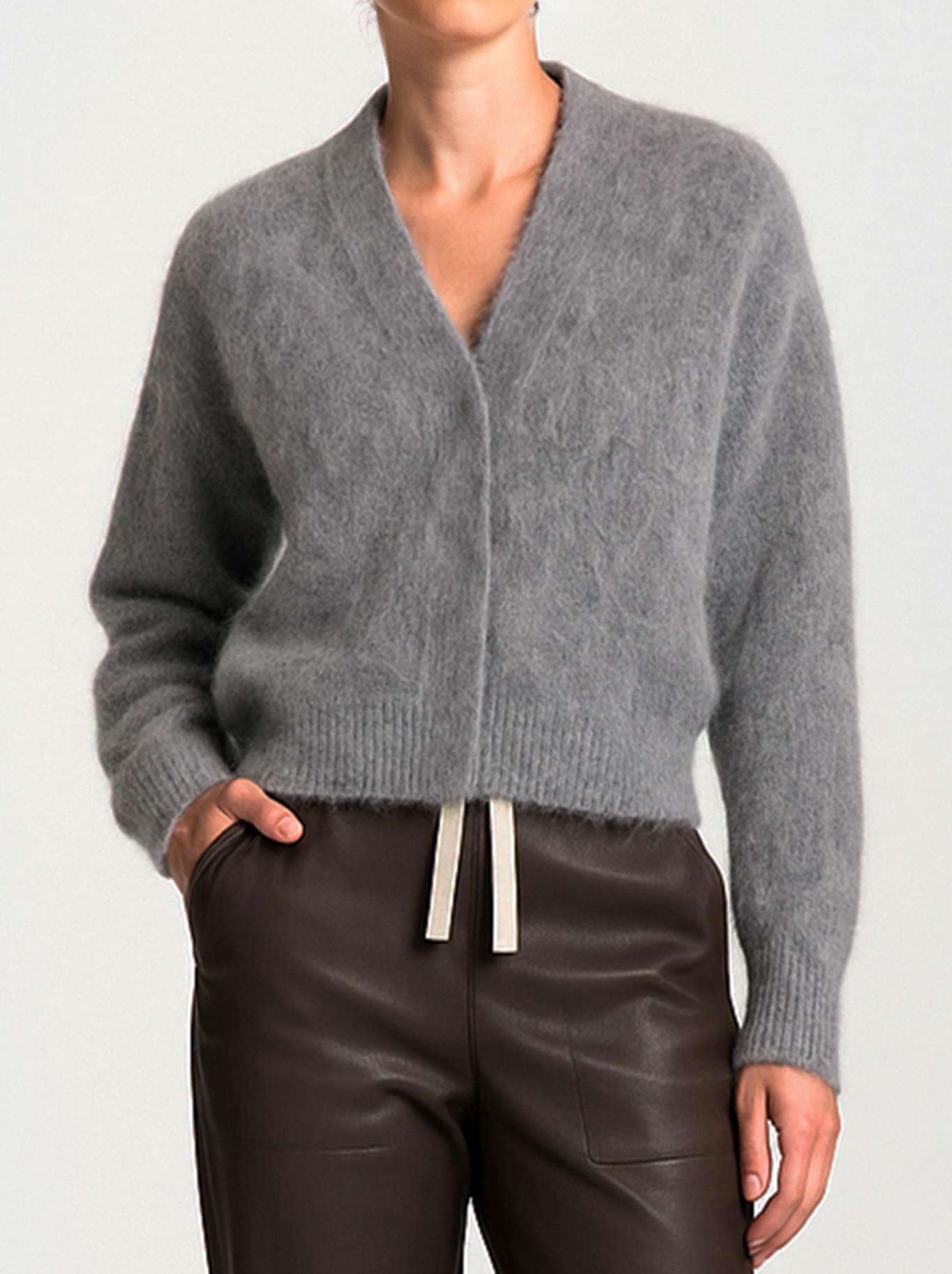 Image of a model wearing Outerwear. Product name - LOUNGE THE LABEL BOSA CARDIGAN in Heather colour by brand - Lounge