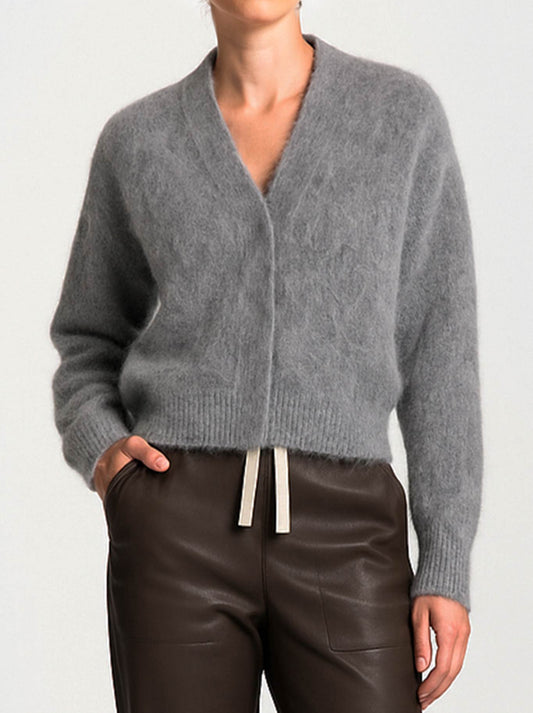 Image of a model wearing Outerwear. Product name - LOUNGE THE LABEL BOSA CARDIGAN in Heather colour by brand - Lounge