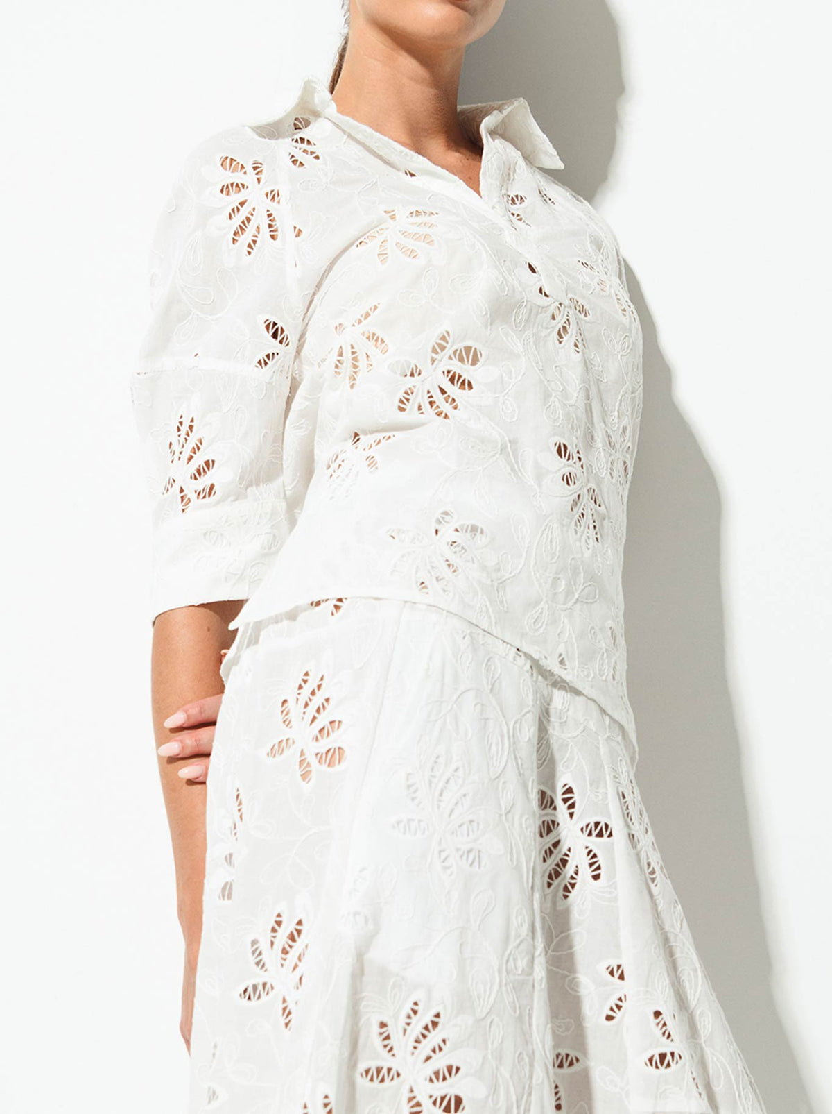 Image of a model wearing Tops. Product name - Lounge The Label Telc Top in White colour by brand - Lounge