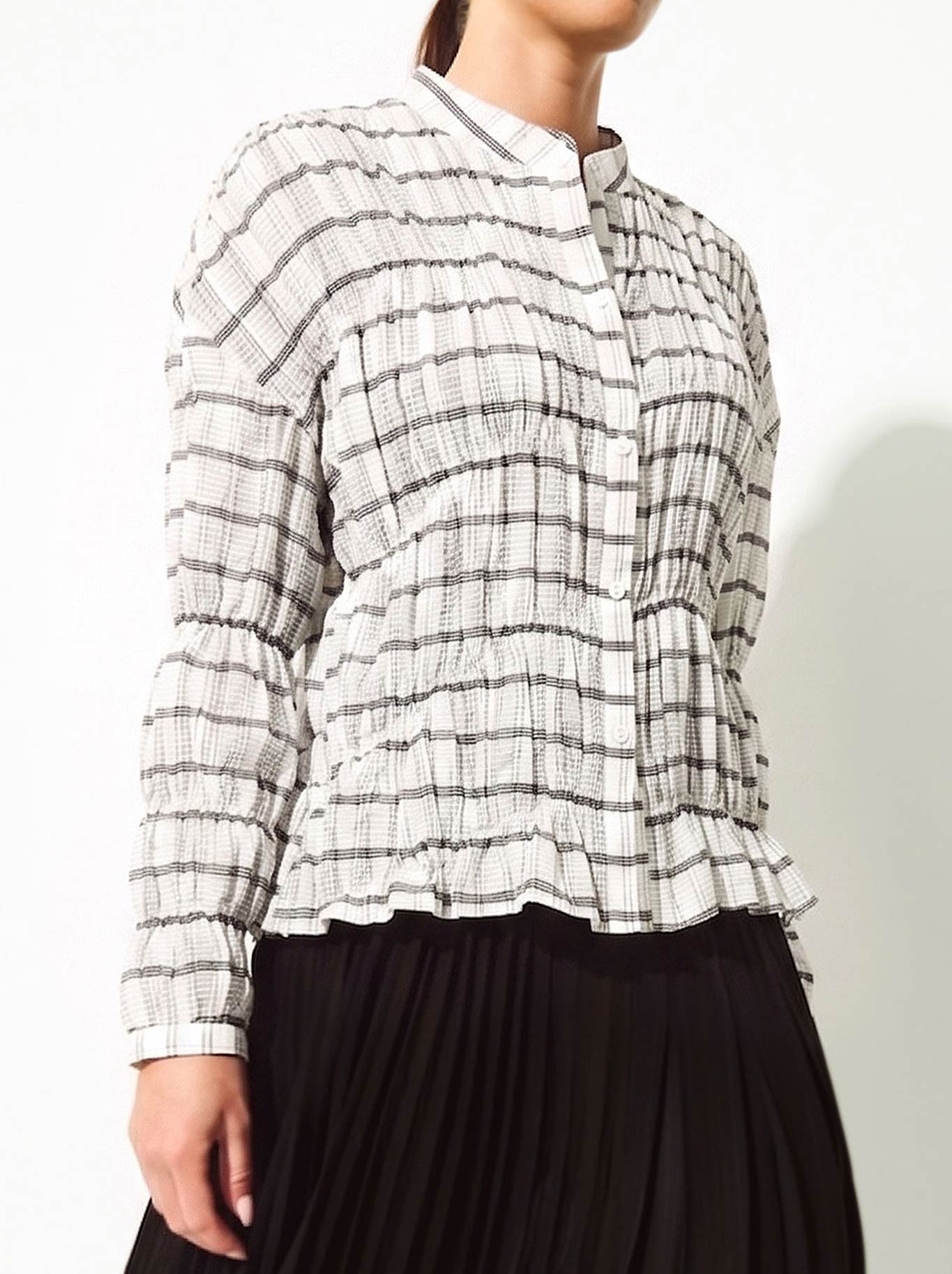 Image of a model wearing Tops. Product name - Lounge The Label Efate Shirt in White/Black colour by brand - Lounge