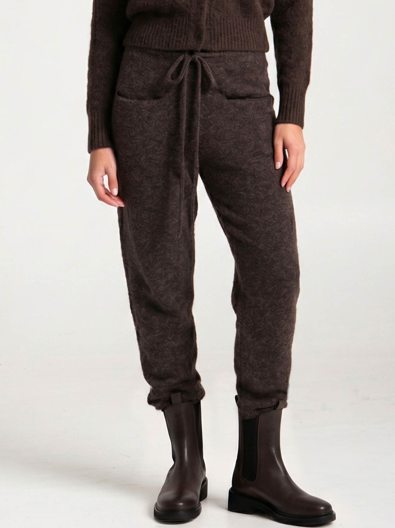 Image of a model wearing Pants. Product name - LOUNGE THE LABEL PALO PANT in Espresso colour by brand - Lounge