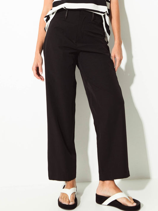Image of a model wearing Pants. Product name - Lounge The Label Moso Pant in Black colour by brand - Lounge