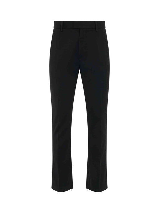 Image of a model wearing Pants. Productname: REPRESENT Tailored Pant in BLACK colour by brand - REPRESENT