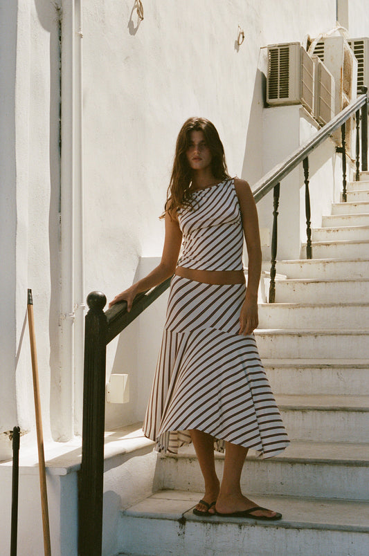 Image of a model wearing Tops. Product name - Maeve Top in Stripe colour by brand - With Jéan