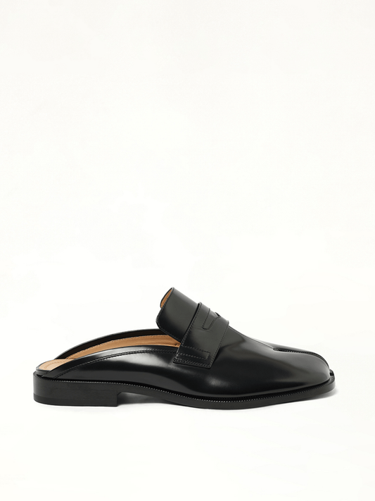 Image of Flats. Product name - Tabi Mule in Black colour by brand - MAISON MARGIELA