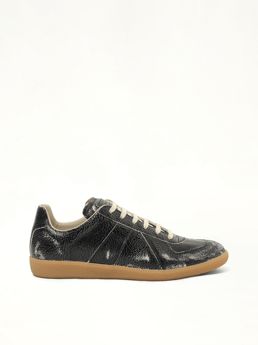 Image of Sneakers. Product name - Replica Crackling Leather Sneaker in Black colour by brand - MAISON MARGIELA