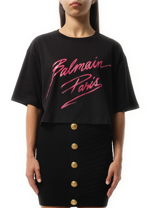 Image of a model wearing Tops. Productname: BALMAIN Balmain Baseball Cropped T-Shirt in Pink colour by brand - BALMAIN