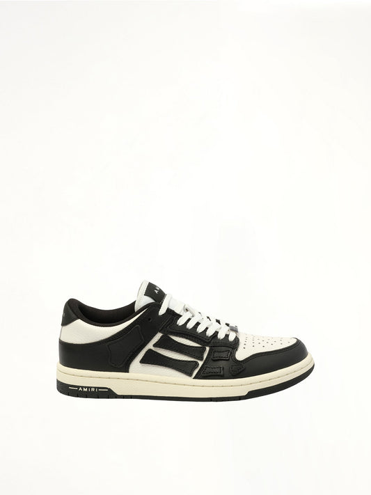 Image of Sneakers. Product name - Skeleton Top Low Sneaker in Black colour by brand - AMIRI