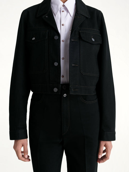 Image of a model wearing Outerwear. Productname: LEMAIRE Cropped Blouson in Black colour by brand - LEMAIRE