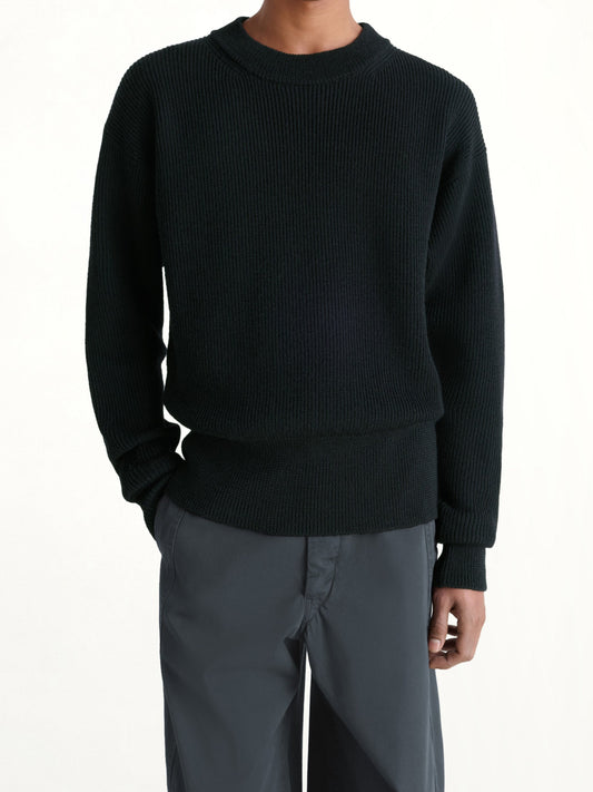 Image of a model wearing Outerwear. Productname: LEMAIRE Boxy Round Neck Sweater in Black colour by brand - LEMAIRE