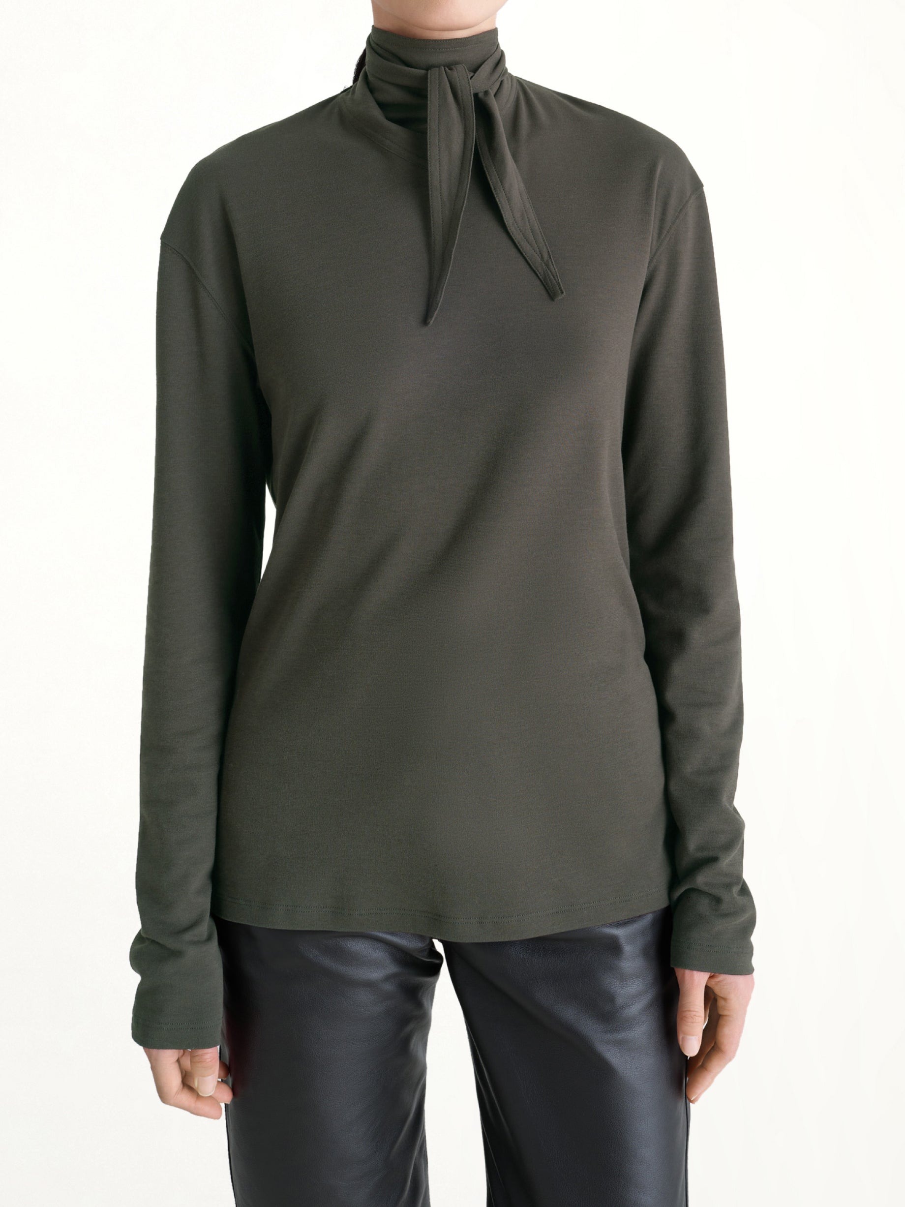 Image of a model wearing Tops. Productname: LEMAIRE Long Sleeve Foulard Top in Dark Espresso colour by brand - LEMAIRE