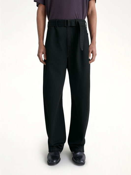 Image of a model wearing Pants. Productname: LEMAIRE Twisted Belted Pants in Black colour by brand - LEMAIRE