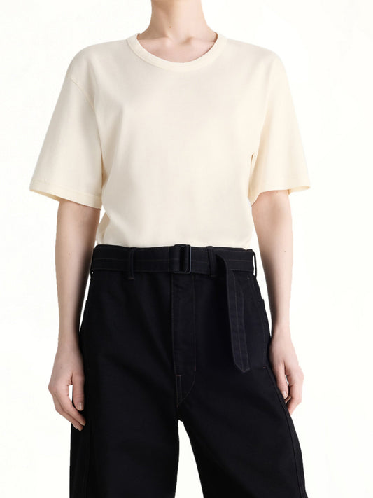 Image of a model wearing Tops. Productname: LEMAIRE Rib SS T-Shirt in Light Cream colour by brand - LEMAIRE