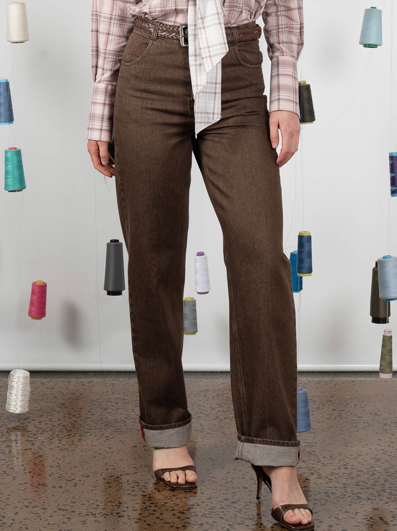 Image of a model wearing Pants. Product name - M.A Dainty Aries Jean in Baci colour by brand - M.A Dainty