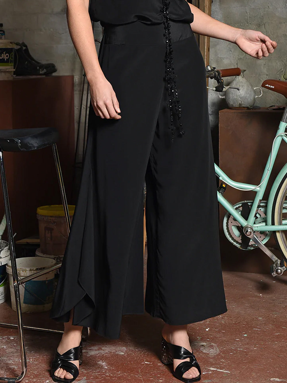 Image of a model wearing Pants. Product name - M.A DAINTY MCGEHEE PANT in Navy colour by brand - M.A Dainty