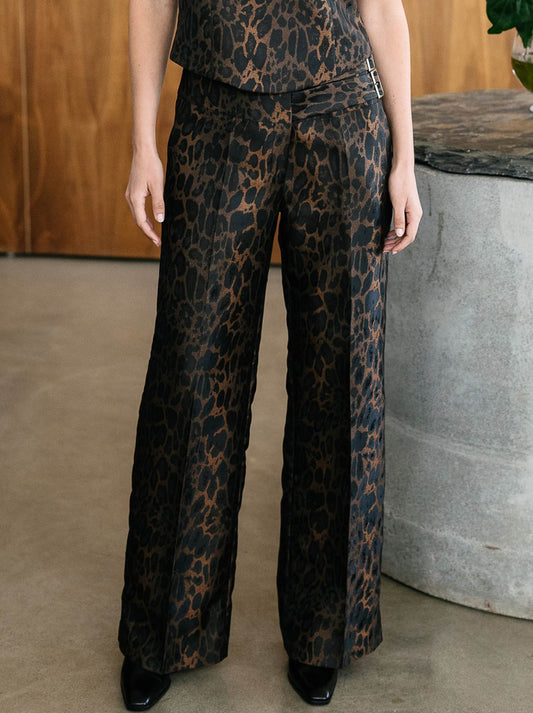 Image of a model wearing Pants. Productname: M.A Dainty Pinot Pant in Leopard colour by brand - M.A Dainty