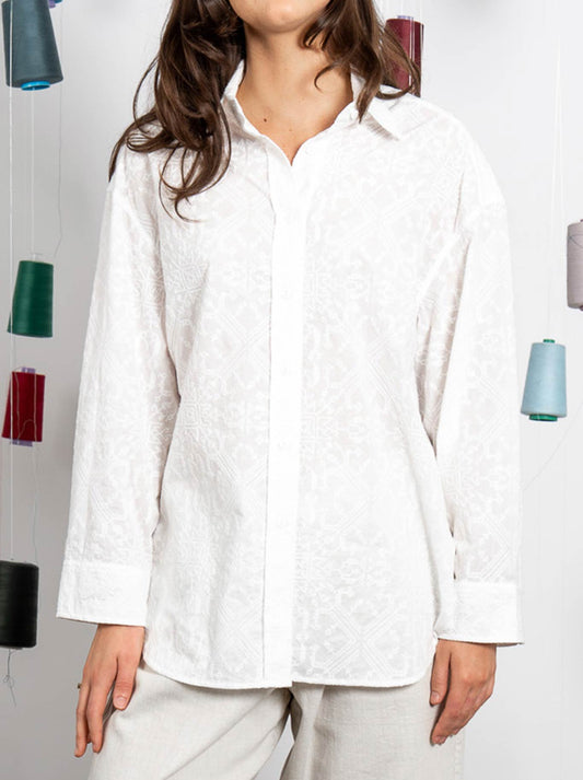 Image of a model wearing Tops. Product name - M.A Dainty Jarrah Shirt in Embroidered White colour by brand - M.A Dainty