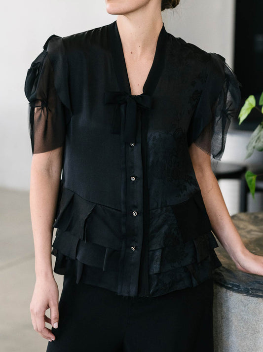 Image of a model wearing Tops. Productname: M.A Dainty Maggie Top in Black colour by brand - M.A Dainty