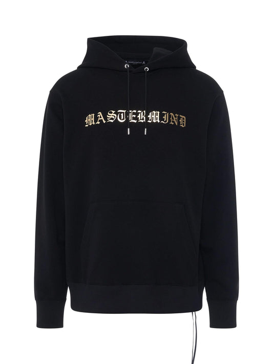 Image of a model wearing Outerwear. Productname: MASTERMIND JAPAN Foil Logo Hoodie in BLACK colour by brand - MASTERMIND JAPAN