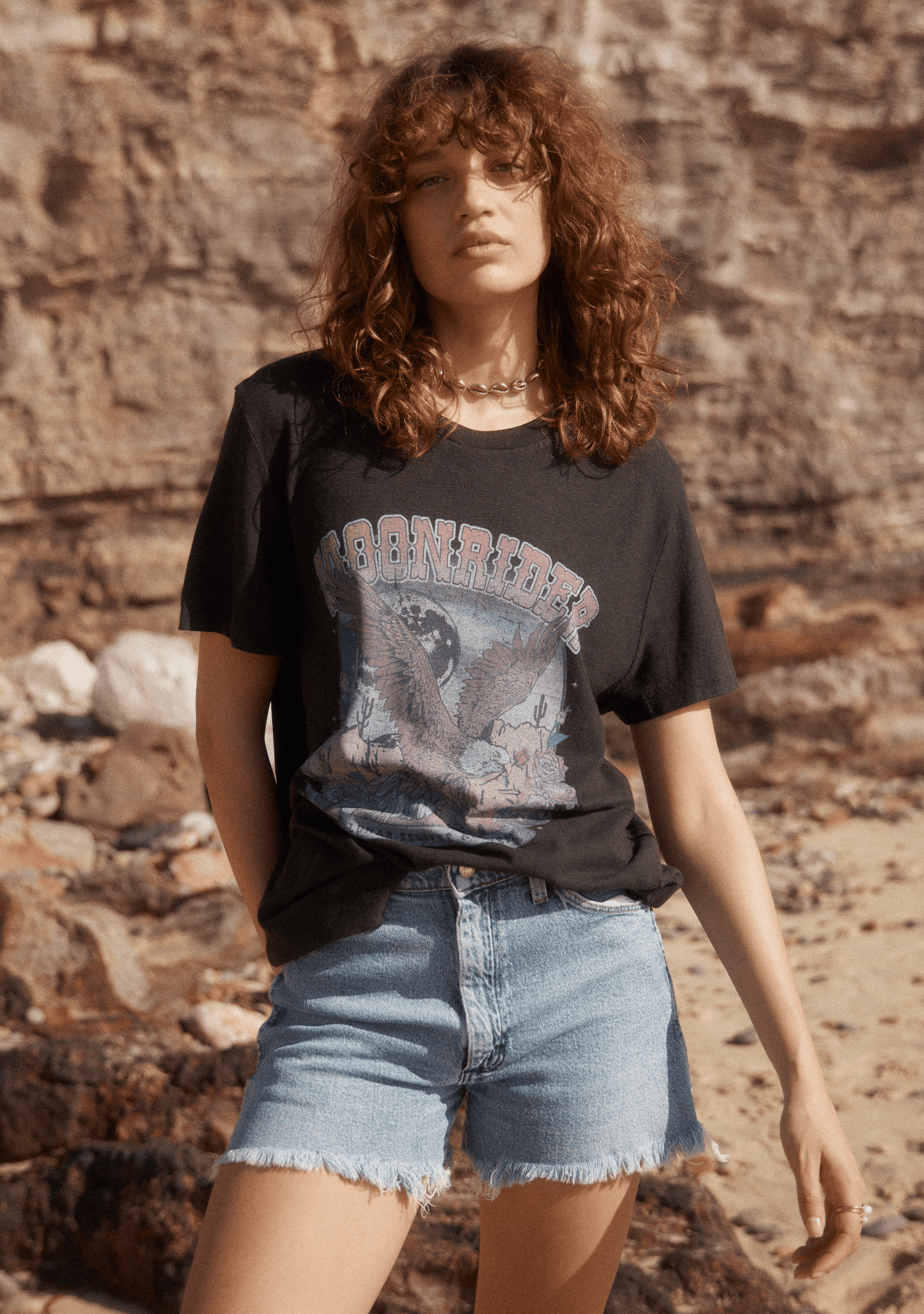 Image of a model wearing Tops. Productname: Auguste The Label Moonrider Classic Tee in Print colour by brand - Auguste The Label
