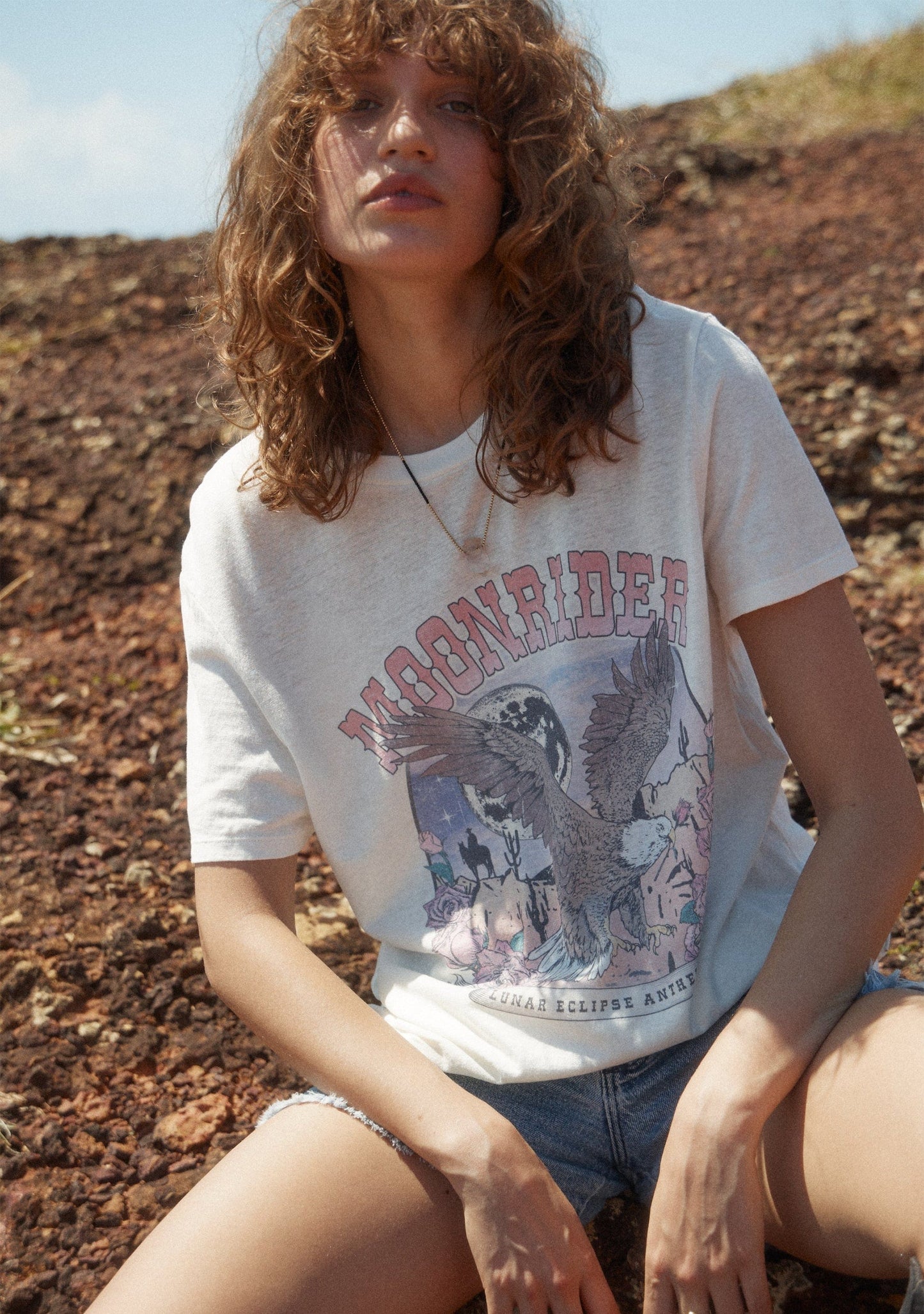 Image of a model wearing Tops. Productname: Auguste The Label Moonrider Classic Tee in White colour by brand - Auguste The Label