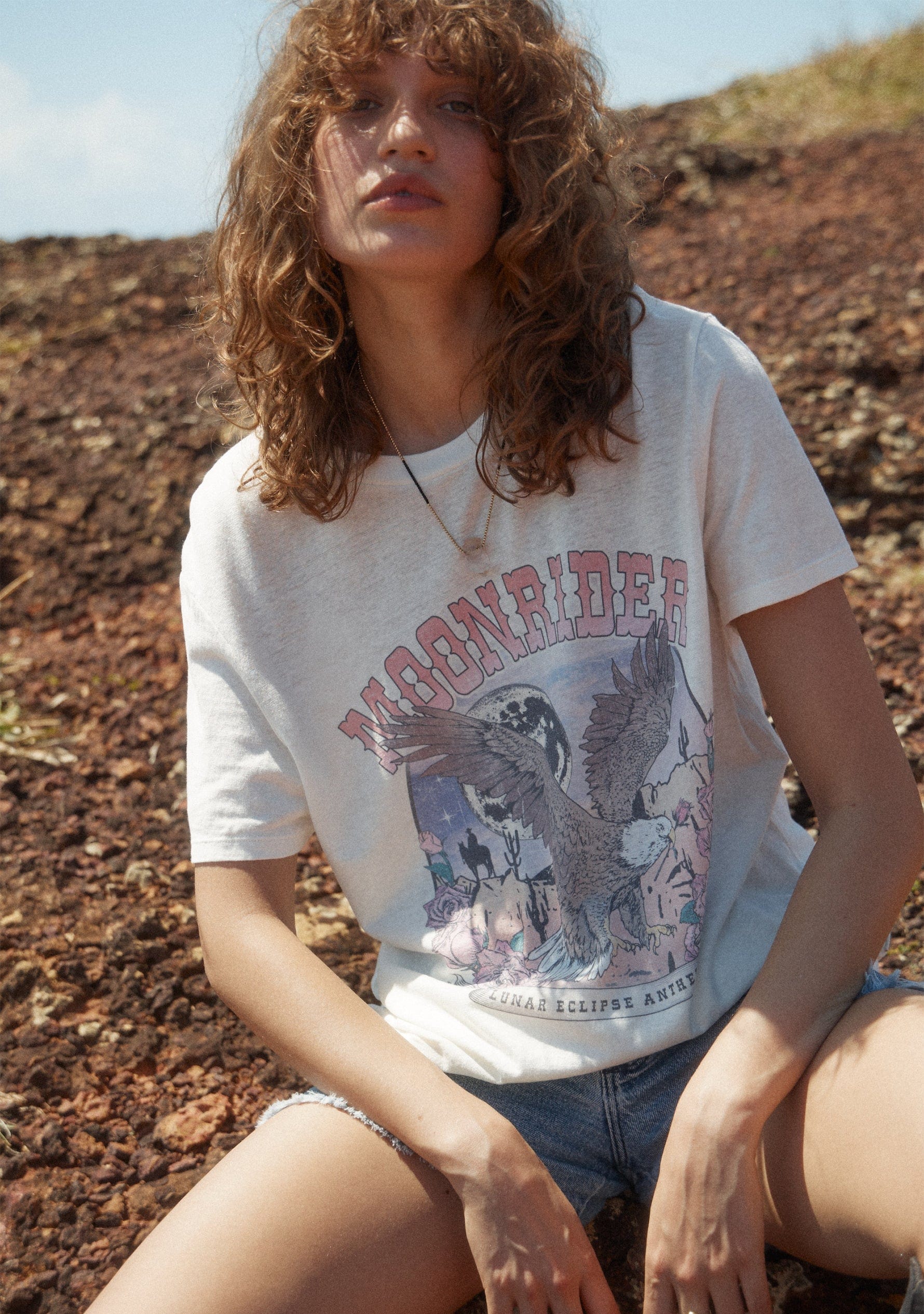 Image of a model wearing Tops. Productname: Auguste The Label Moonrider Classic Tee in White colour by brand - Auguste The Label