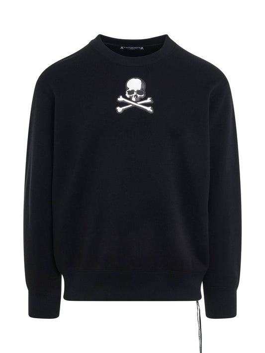 Image of a model wearing Outerwear. Productname: MASTERMIND Skull Emblem Sweatshirt in BLACK colour by brand - MASTERMIND
